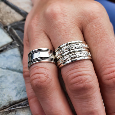 mens adjustable ring with a spinner ring